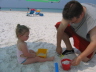 Lizzie And Dada Build Sandcastles