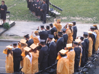 The Graduates Move Their Tassels