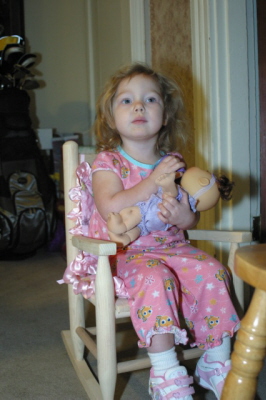 Lizzie With Her New Baby In Her New Rocking Chair