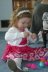 Lizzie Tries Hard To Open The Egg